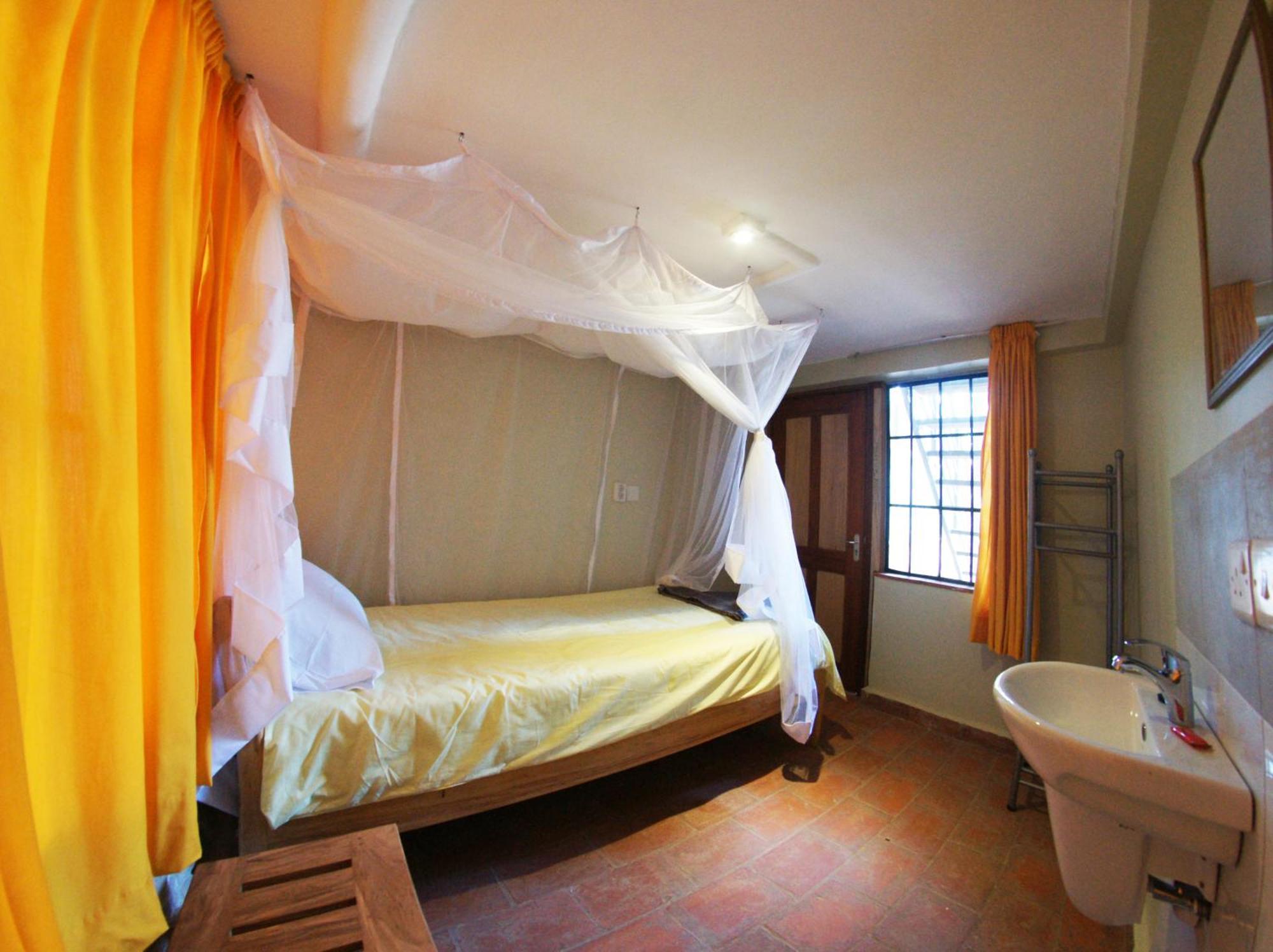 Yellow Haven Lodge Kampala Rum bild